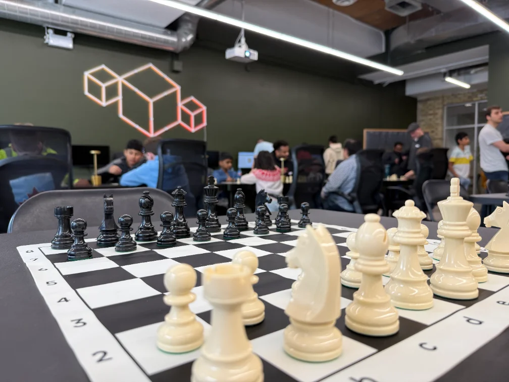 Players at the boards in the Vector Space room