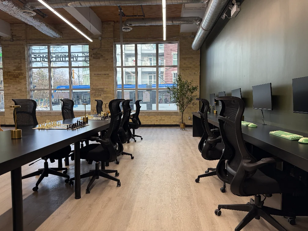 The main room at the Vector Space: work tables and computer workstations under nano lights